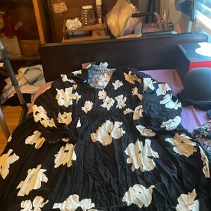 Woman’s dress made by  AVA VIV size 4X long sleeved elastic. V-neck NWT.